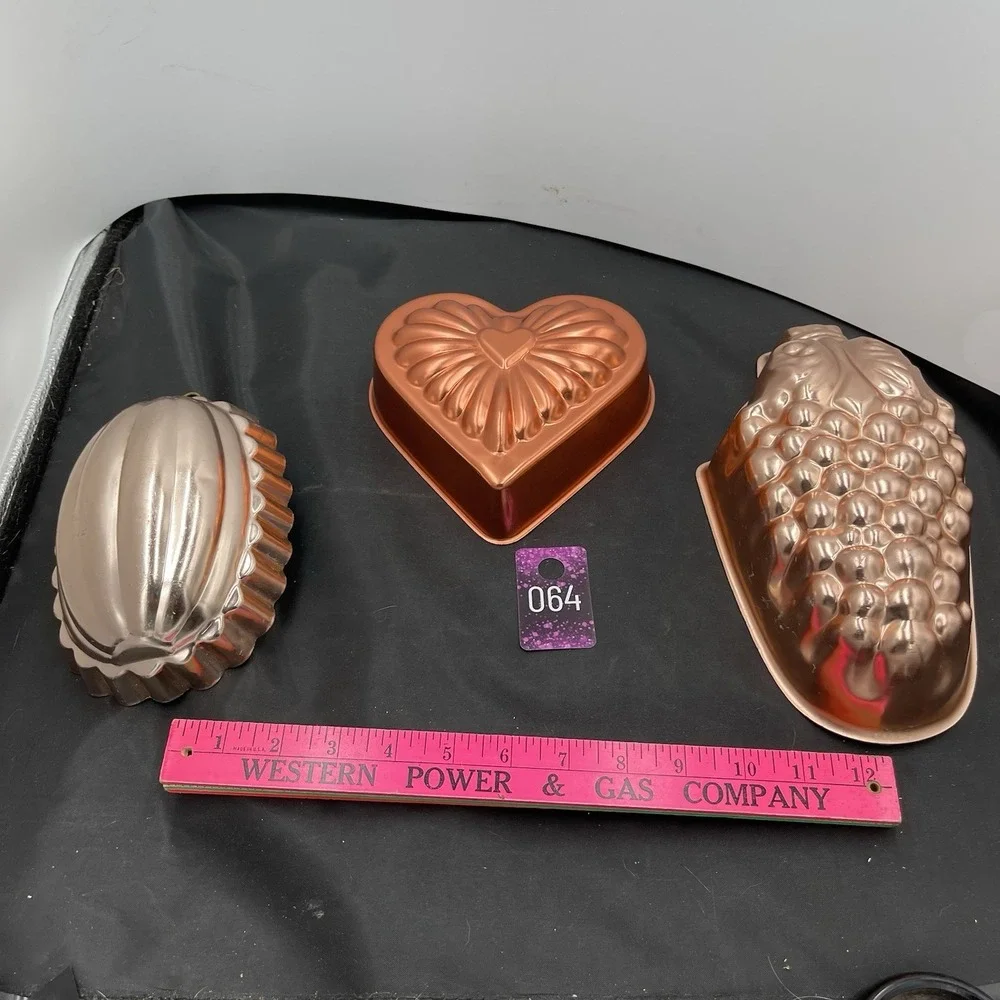 Three metal  Jell-O‎ wall hanging mold